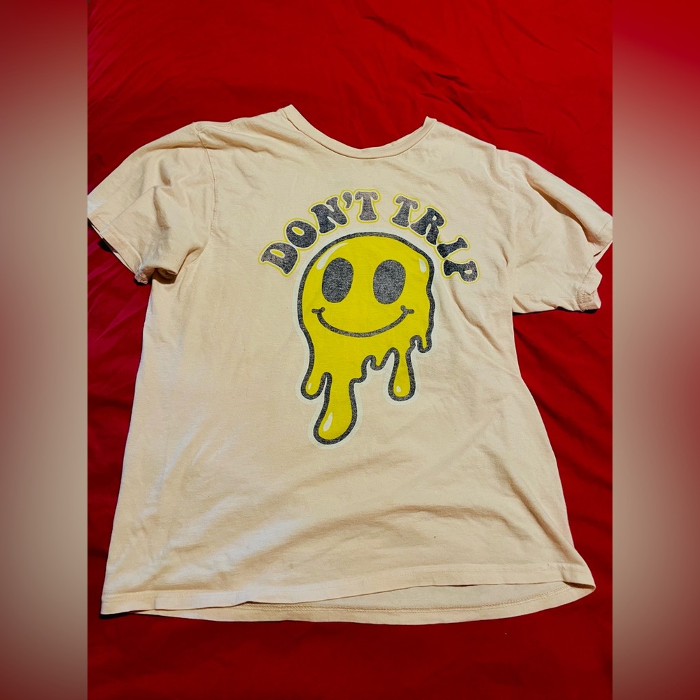 Cream and yellow “Don't Trip” graphic tee